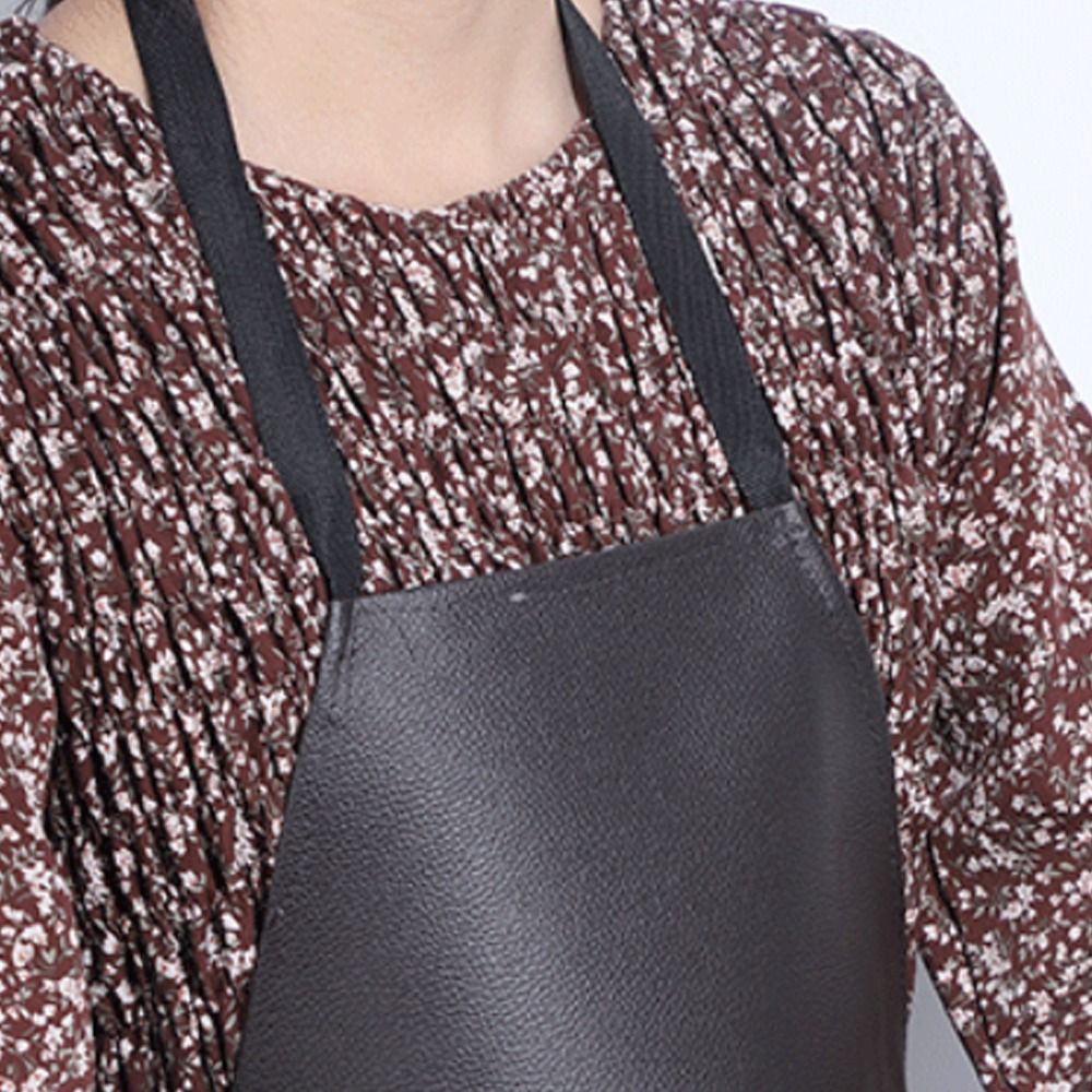 Verstelbare lange PVC anti-vui - Leatherwork Apron recensie en prijs